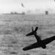 An A6M Zero crashes into the sea after an unsuccessful attempt to strike the USS Essex (CV-9) during the Battle of Okinawa in May 1945 (US Navy)